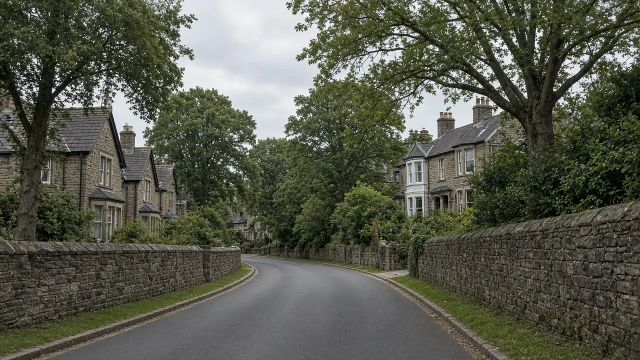 Example image: a curving road of stone villas with mature trees